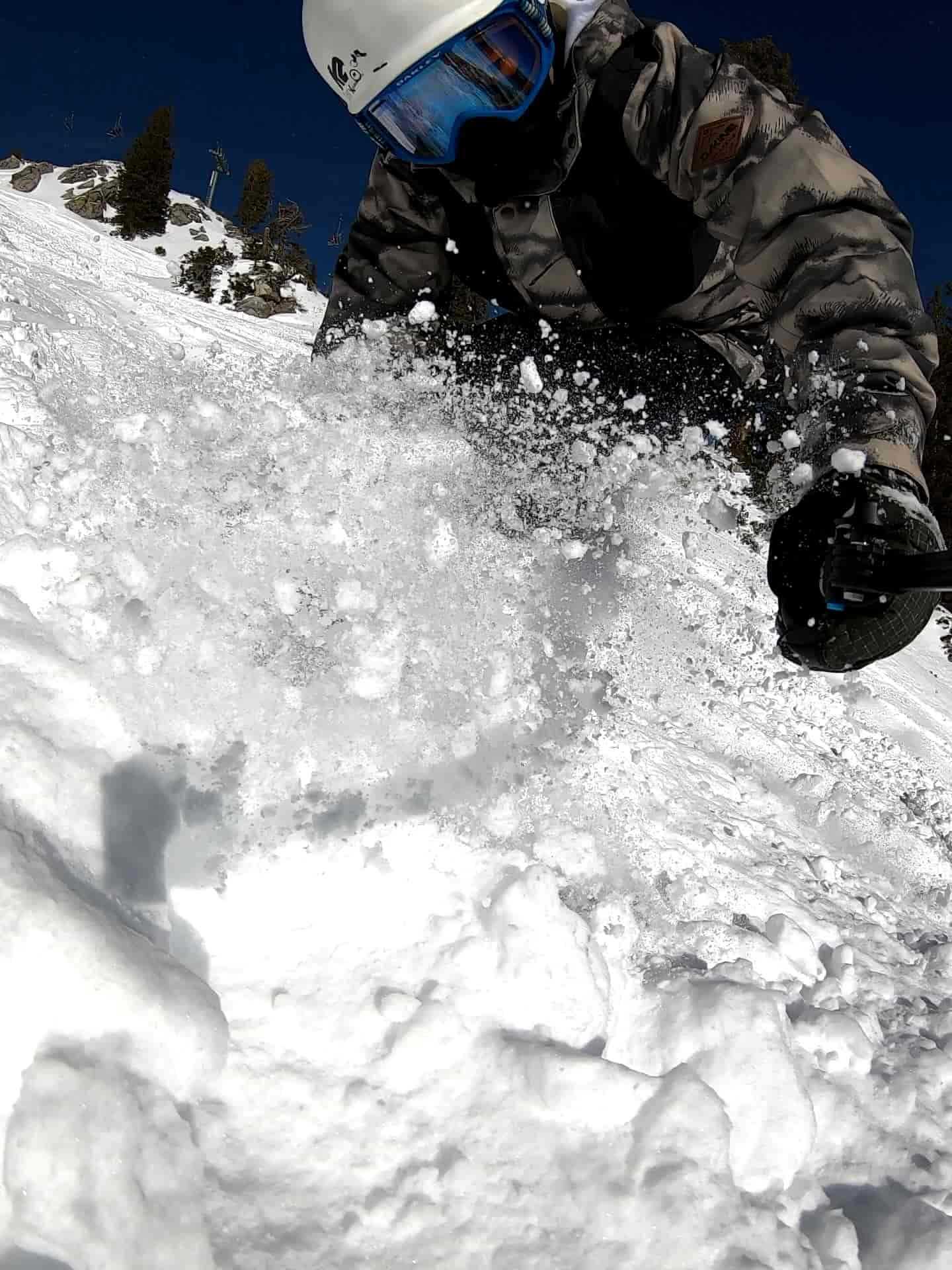 Snowboarding in powder